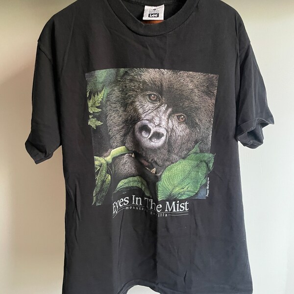 Vintage 1992 eyes in the mist mountain gorilla T-shirt. Size large. By Lee. Heavy weight cotton. Made in the USA. 21” armpit to armpit.