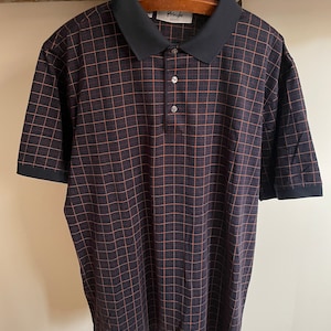 Vintage Pringle Scotland plaid polo shirt. Size medium. 100% Pima cotton. Oversize fit. 24” armpit to armpit. 30” long