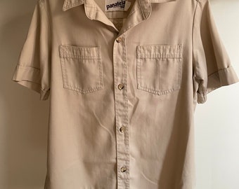 Vintage 1970’s Levis Pantela safari shirt. Size large. Excellent condition. 24” armpit to armpit. 29” long