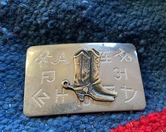 Vintage cow branding cowboy belt buckle 3” x 2” solid steel and brass. Made in the USA. Chambers belt co.