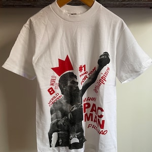 Manny Pacquiao pac man #1 pound for pound Philippines boxing tshirt. Size small. By Alstyle. 100% cotton. 19” armpit to armpit. 26” long