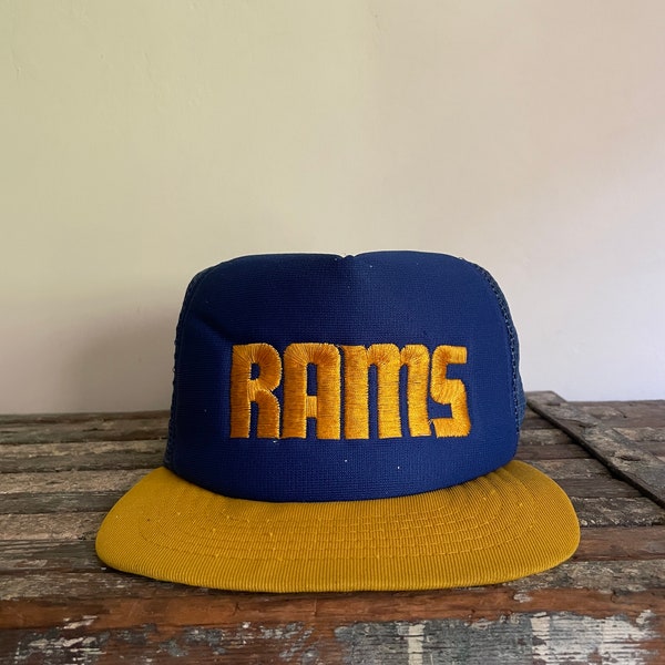 Vintage 1980’s NFL Los Angeles Rams trucker cap. By new era. Made in the USA. One size fits all. DuPont visor. Pro design. Officially licens