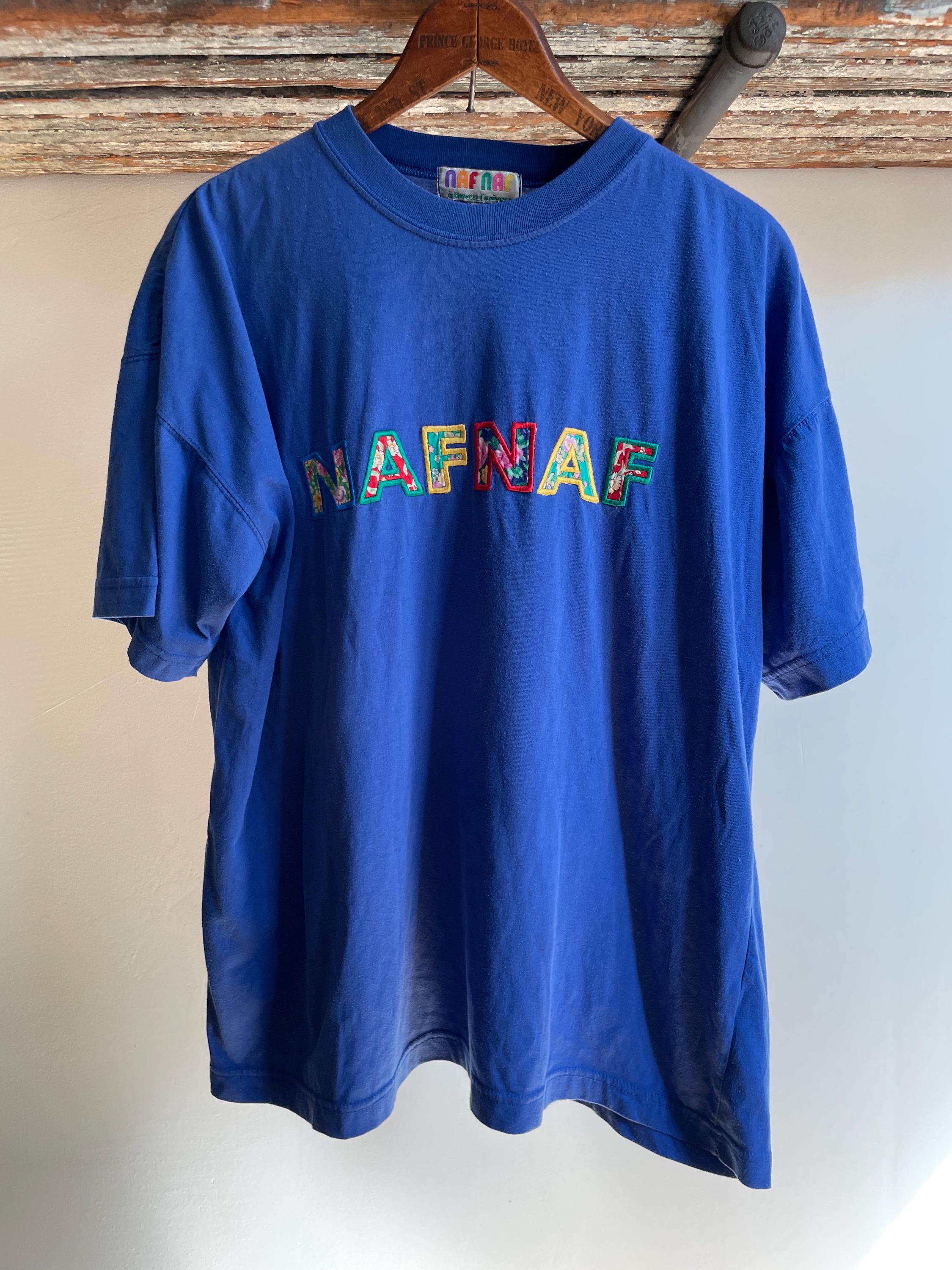 Vintage 90's Naf Naf French Boxy T-shirt. 23” Armpit to Armpit. 27
