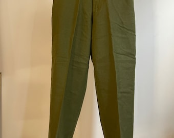 Vintage USA military wool Field Trouser 18oz. Adjustable waist and suspender buttons. Size medium regular. 34” waist. 32” inseam. 13” rise