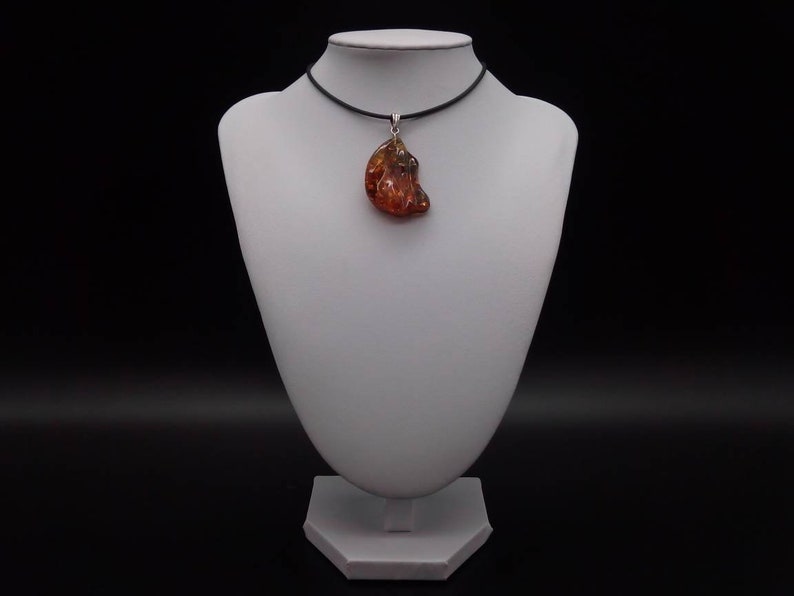 The natural Baltic Amber pendant 35x30 mm Unregular shape 1.37x1.18 inches