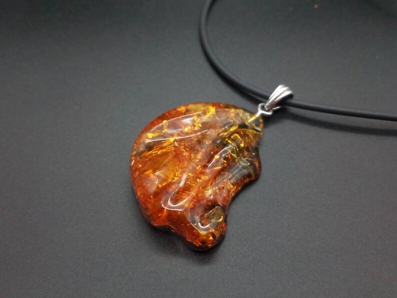 The natural Baltic Amber pendant 35x30 mm Unregular shape 1.37x1.18 inches