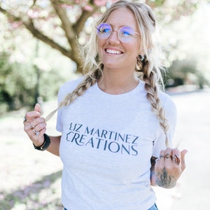 ASH GRAY Liz Martinez Creations Short-Sleeve Unisex T-Shirt MERCH