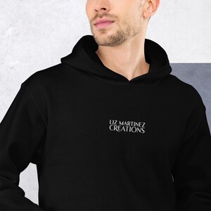 MIDNIGHT BLACK Liz Martinez Creations Unisex Hoodie MERCH