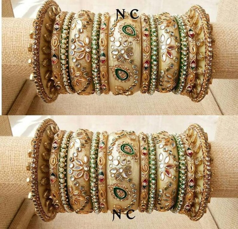 wedding bangles sabyasachi jewelry Pearl wedding jewelry bridal chooda statement jewelry gold bangles kundan Indian bridal bangles