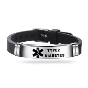 May include: Black silicone bracelet with a silver metal plate that says "TYPE 2 DIABETES" and has a medical symbol with a snake.