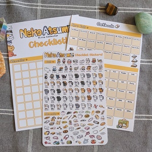 Lista de calcomanías de Neko Atsume para diario de cuadrícula de puntos o agenda de viñetas