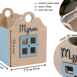 May include: A wooden toy house shaped storage box with a blue door and window. The house is 7.5 inches wide and 10 inches tall. The name "Myron" is written on the front of the house in a 3D font.
