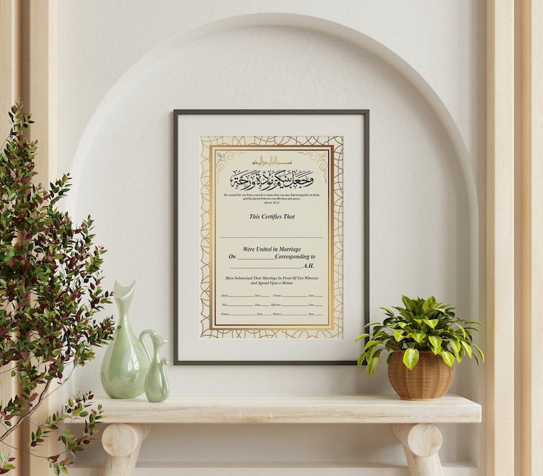 May include: A gold framed certificate with an ornate border and Arabic calligraphy. The text reads "This Certifies That... Were United in Marriage... Corresponding to... A.M."