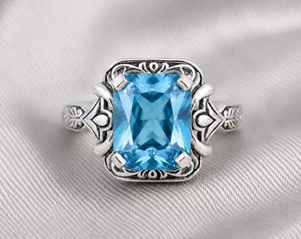 Bague topaze naturelle, bague de fiançailles pour femme en argent sterling Art déco taille princesse avec pierres précieuses bleues.