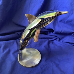 Dolphin silverware sculpture