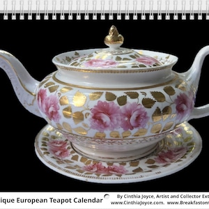 May include: An antique European teapot and saucer set. The white porcelain is decorated with pink roses and gold leaf accents. The teapot has a curved spout and handle, and a lid with a gold finial. The set is displayed on a black background.