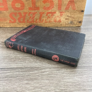 May include: A black hardcover book titled "The  Fears Before Swine" by Margery Allingham. The book is part of The Crime Club Collection.