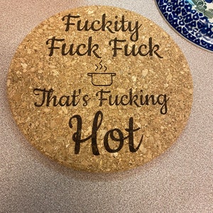 Humorous Laser Engraving - Fuckity Fuck Fuck Thats Fucking Hot- Functional & Playful - Durable & Heat-Resistant Cork - 7-inch Compact Size - Protects Countertops & Tables