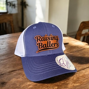 Birthday Gift for Baseball Mom, Raising Ballers Ponytail Hat, Softball Mom Trucker Hat, Women’s Snapback with Hidden Ponytail Slot