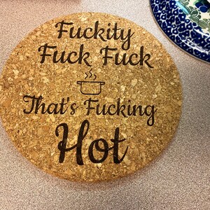 Humorous Laser Engraving - Fuckity Fuck Fuck Thats Fucking Hot- Functional & Playful - Durable & Heat-Resistant Cork - 7-inch Compact Size - Protects Countertops & Tables