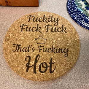 Humorous Laser Engraving - Fuckity Fuck Fuck Thats Fucking Hot- Functional & Playful - Durable & Heat-Resistant Cork - 7-inch Compact Size - Protects Countertops & Tables
