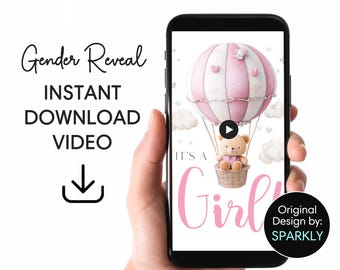 May include: A smartphone displays a gender reveal video with a pink hot air balloon, a teddy bear, and the text "It's a Girl." The phone is held in a hand. The words "Gender Reveal" and "Instant Download Video" are also visible.