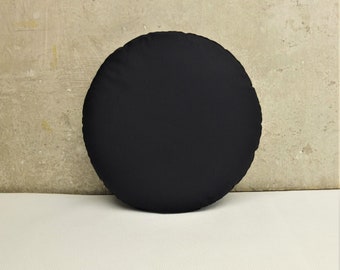 round, black outdoor cushion