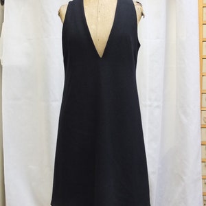 Vestido de tirantes en mezcla de lana elástica con forro elástico. Talla 42