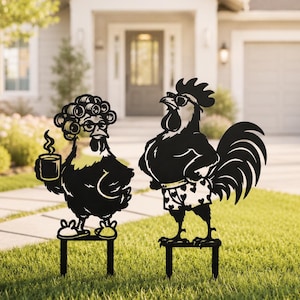 May include: Two black metal garden stakes featuring silhouettes of chickens. One chicken wears hair rollers, glasses, and slippers while holding a steaming mug. The other chicken wears sunglasses and heart-patterned swim trunks.