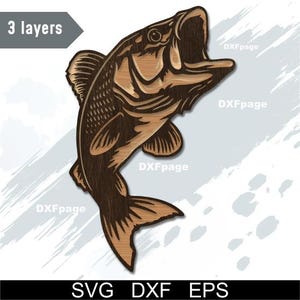 May include: A detailed wooden cutout of a largemouth bass with its mouth open. The fish is in shades of brown and tan, with visible wood grain. The image includes the text "3 layers" and file type options: SVG, DXF, and EPS.