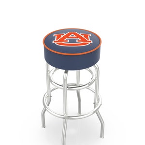 May include: A chrome bar stool with a blue and orange padded seat featuring the Auburn University logo.