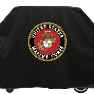 May include: Black grill cover with the United States Marine Corps logo in gold and red.