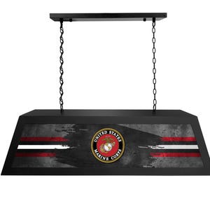 May include: Black pool table light with a distressed gray and red background featuring the United States Marine Corps emblem. The light is suspended from a black chain.