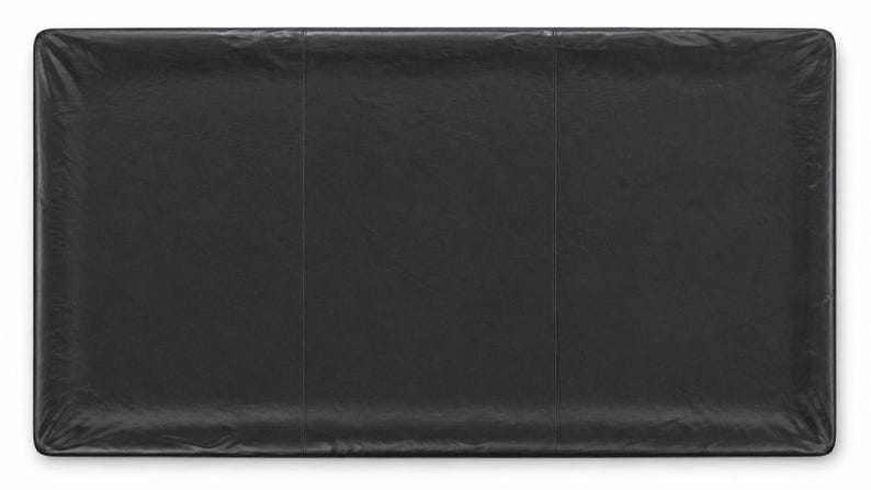 Top view of the pool table cover shown in a heavy duty black vinyl upholstery