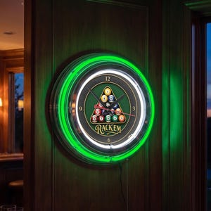 May include: A round wall clock featuring a bright green neon light ring and a white inner neon ring. The clock face displays a triangular rack of colorful billiard balls and the text RACK'EM in a stylized font with black clock hands.