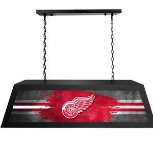 May include: Black hanging light fixture with a red, white, and gray Detroit Red Wings logo on a distressed background.