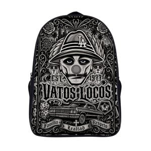 May include: A black backpack featuring a detailed grayscale graphic print. The design includes a central figure wearing a fedora with an LA logo, the text VATOS LOCOS, EST 1977, and a classic car. Below, a banner displays the words Familia, Lealtad, Respeto.