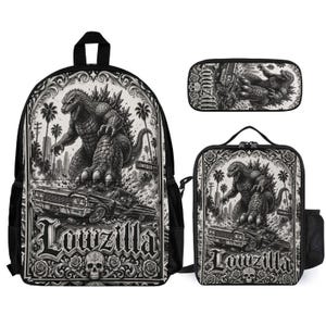 May include: A black and white backpack, lunch bag, and pencil case set featuring a graphic illustration of a monster standing over a lowrider car. The design includes palm trees, a skull, and the text Lowzilla in a bold, decorative font style.