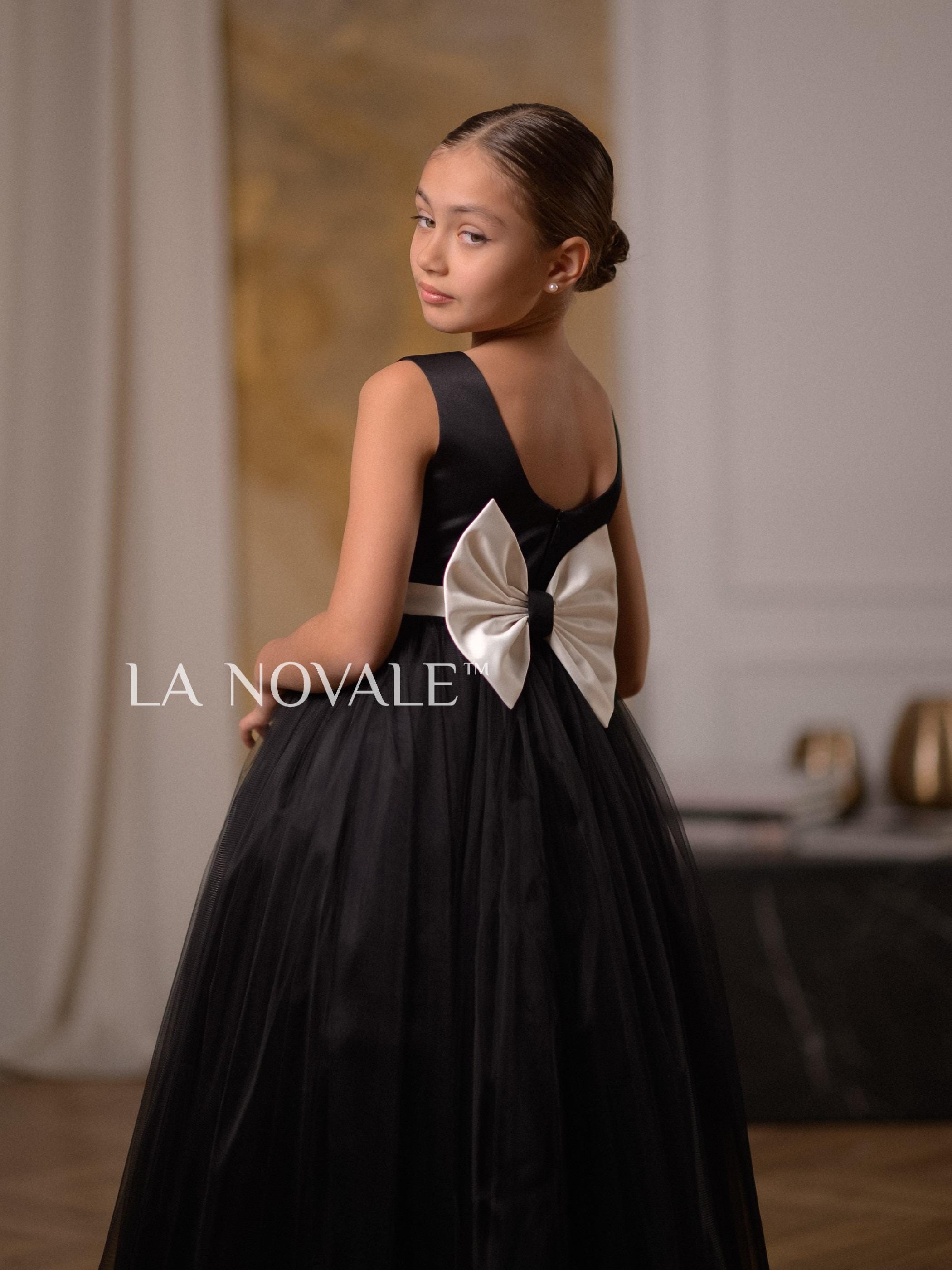 junior formal black dresses Azazie Arianthe tone tulle skirt with removable asymmetric overskirt is perfect to be worn as Black and White flower girl