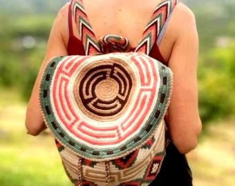 Wayuu backpack hand-woven in Colombia with safety closure and adjustable handles