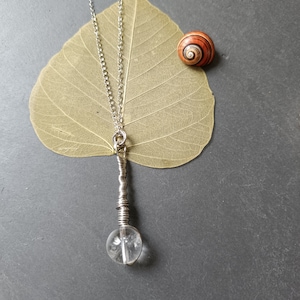 Rock crystal ball pendant on a stainless steel chain. Statement necklace. Unique piece. Necklace with ball. Stainless steel jewelry. Pendulum. Crystal jewelry
