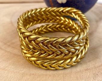 Braided golden Buddhist bangle bracelets