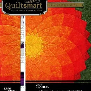 May include: A quilting pattern featuring a vibrant, abstract floral design in shades of red, orange, and yellow. The "Quiltsmart" logo is prominently displayed, along with text indicating "Printed Interfacing" and "Dahlia" pattern details. The design promises easy and fast quilting.