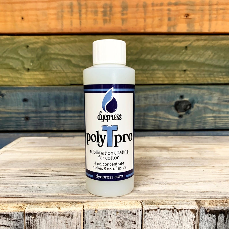 May include: A clear plastic bottle with a white cap and a blue label. The label says "dyepress polyTpro sublimation coating for cotton 4 oz. concentrate makes 8 oz. of spray dyepress.com".