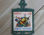 Vintage Small Cast Iron and Tile Wall Trivet Native American Motif quot Home of the Free, Land of the Brave quot