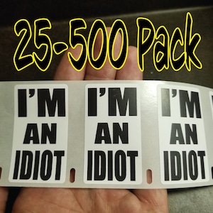 I'M AN IDIOT 25-500Pack Lot Bulk Gag Hartmütze Aufkleber Aufkleber Etiketten April Narren Du bist im