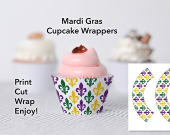 May include: Printable Mardi Gras cupcake wrappers with a fleur-de-lis pattern in green, purple, and gold. The text "Print Cut Wrap Enjoy!" is visible in the image.