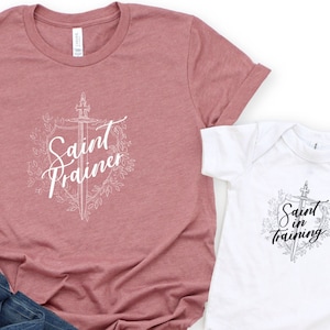 Floral Saint Trainer T Shirt - Catholic Apparel Women - Catholic mother, teacher, homeschool mom gift - Unisex Short Sleeve Tee