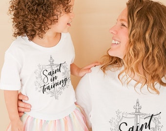 YOUTH Saint in Training T Shirt - Catholic Apparel for Boys and Girls - Unisex Jersey Short Sleeve Tee