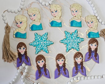 These 12 delicious cookies are decorated with designs inspired by Frozen's characters, including Elsa, Ana, Olaf, Snowfand a birthday number